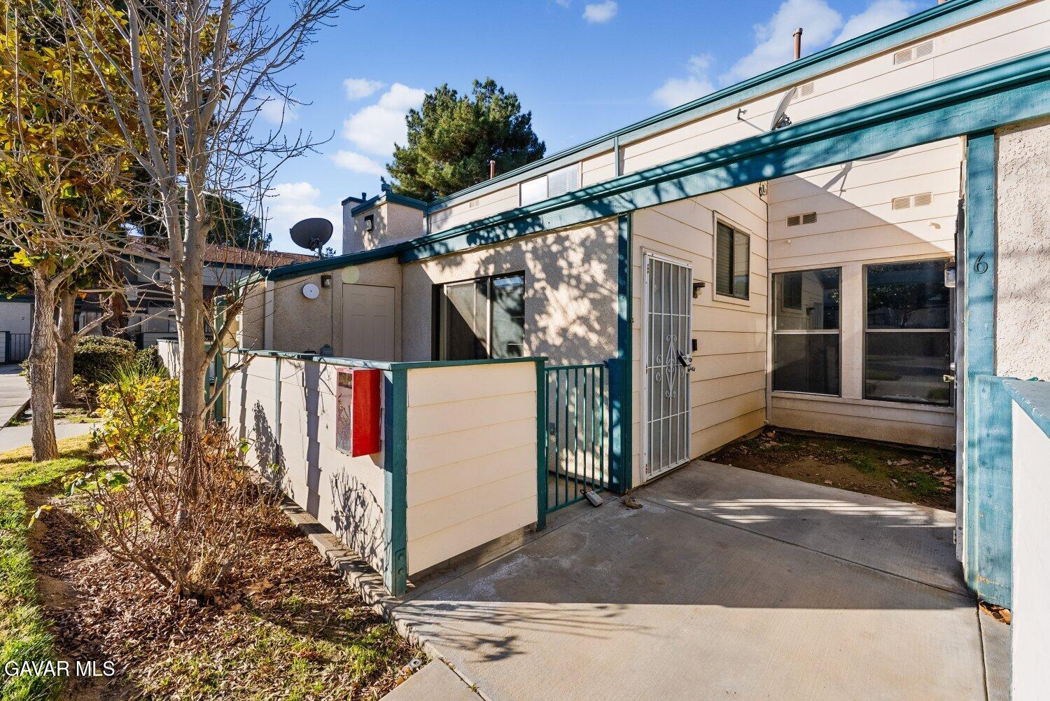 44526 15th Street East, Unit 4 Lancaster, CA 93535 - Photo 41 of 52 a view of a house with a tree