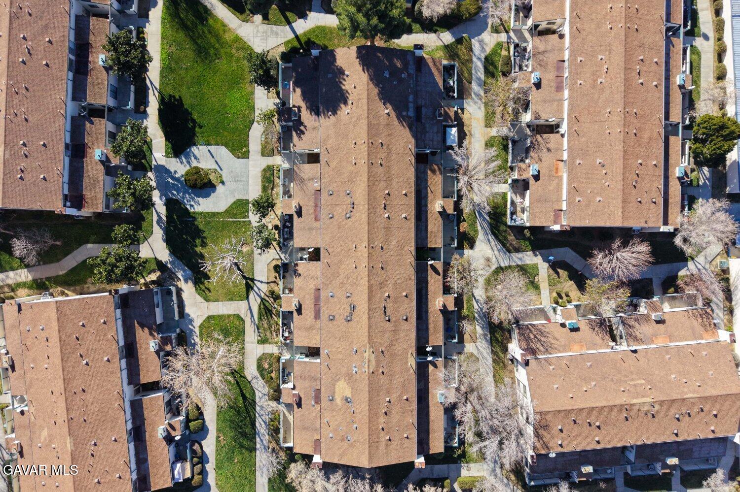 44526 15th Street East, Unit 4 Lancaster, CA 93535 - Photo 48 of 52 an aerial view of multi story residential apartment building with yard
