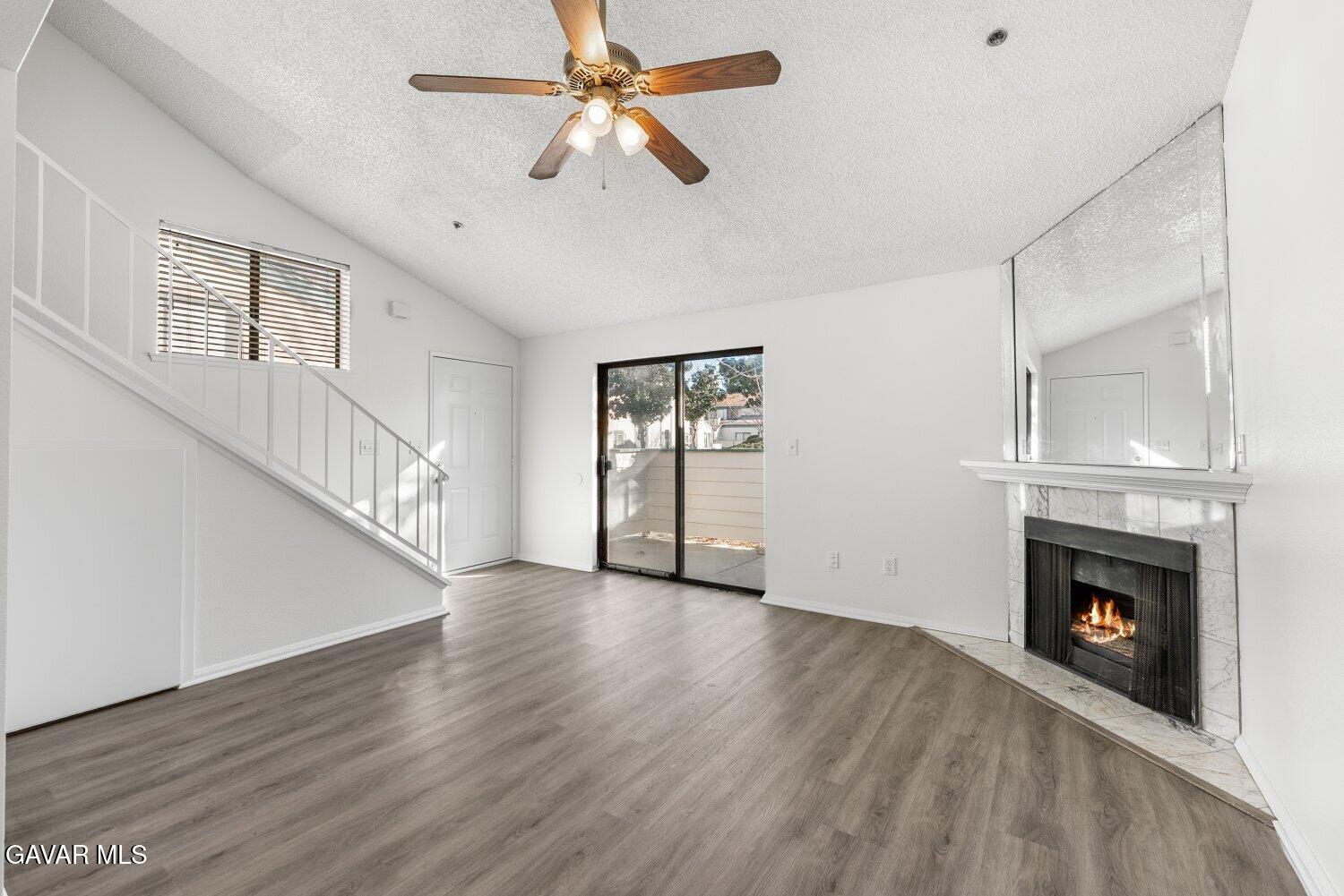 44526 15th Street East, Unit 4 Lancaster, CA 93535 - Photo 6 of 52 a view of empty room with wooden floor and fan