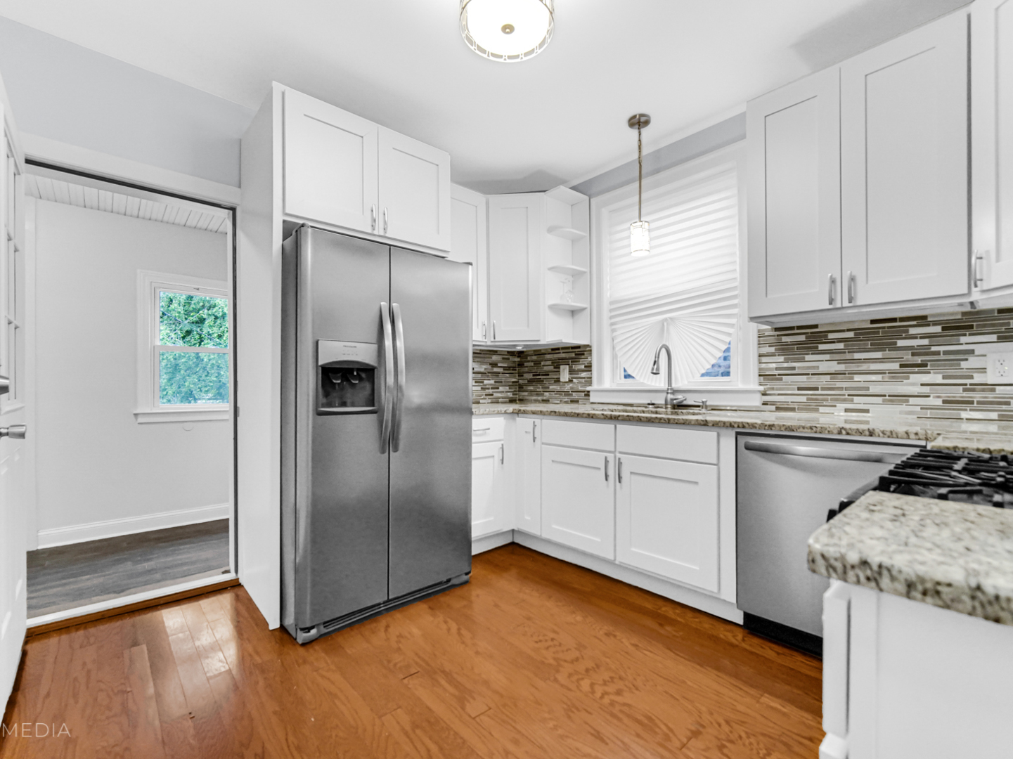 8553 South Sangamon Street Chicago, IL 60620 - Photo 13 of 27 a kitchen with a refrigerator sink and cabinets