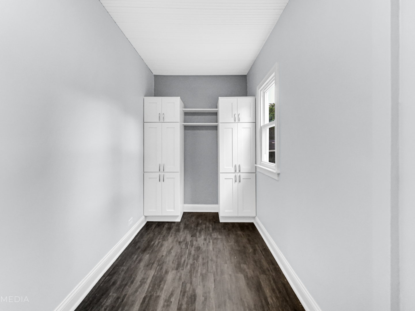 8553 South Sangamon Street Chicago, IL 60620 - Photo 15 of 27 a view of a room with wooden floor and staircase