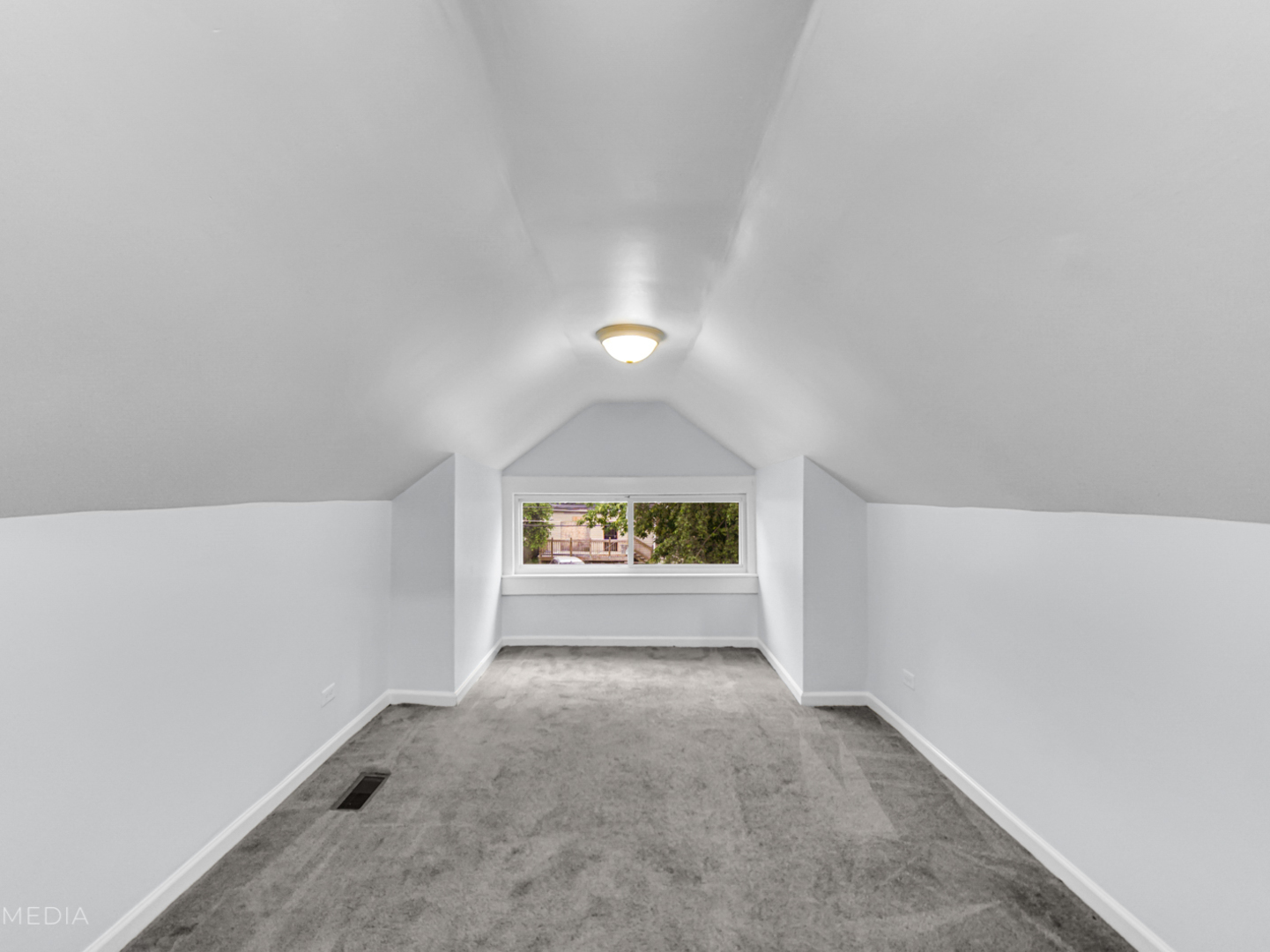 8553 South Sangamon Street Chicago, IL 60620 - Photo 17 of 27 an empty room with a window