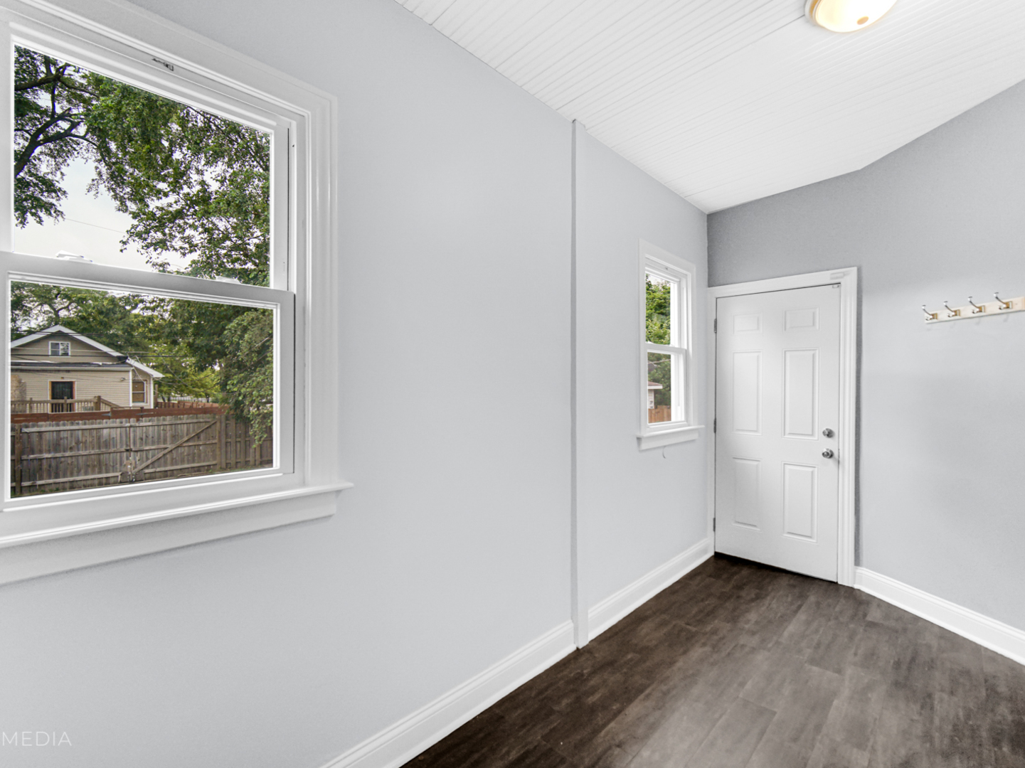 8553 South Sangamon Street Chicago, IL 60620 - Photo 18 of 27 a view of a room that has a window in it