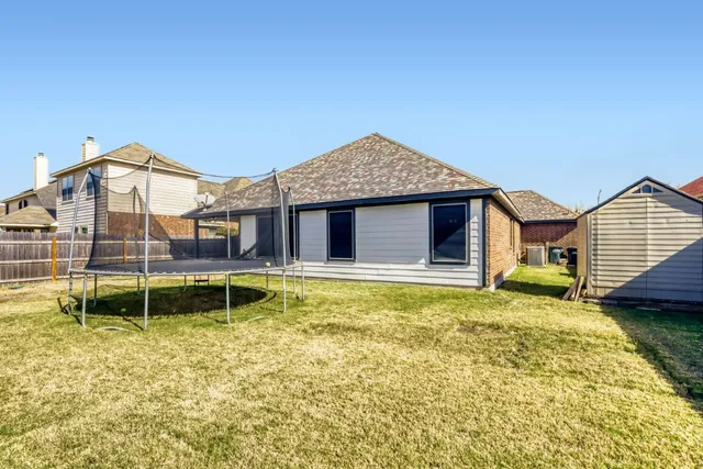 a view of a house with a swimming pool