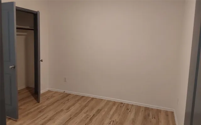 a view of a kitchen from the hallway