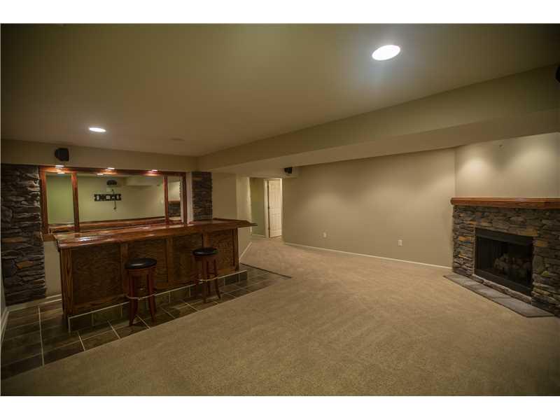 106 Rock Run Road Canonsburg, PA 15317 - Photo 19 of 25 Basement/Game Room. Finished game room on the lower level with stone fireplace.