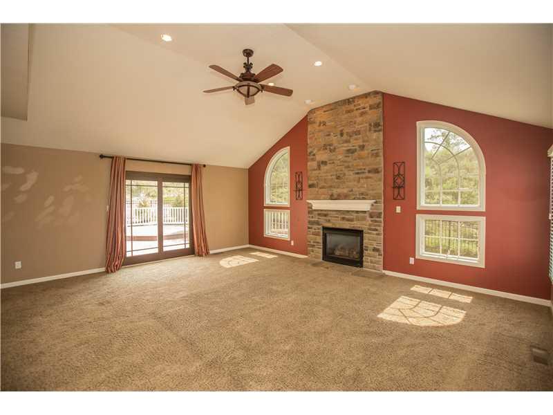 106 Rock Run Road Canonsburg, PA 15317 - Photo 9 of 25 Den/Family/Great Room. Vaulted ceiling in the family room, accentuate the gas stone fireplace in the family room.