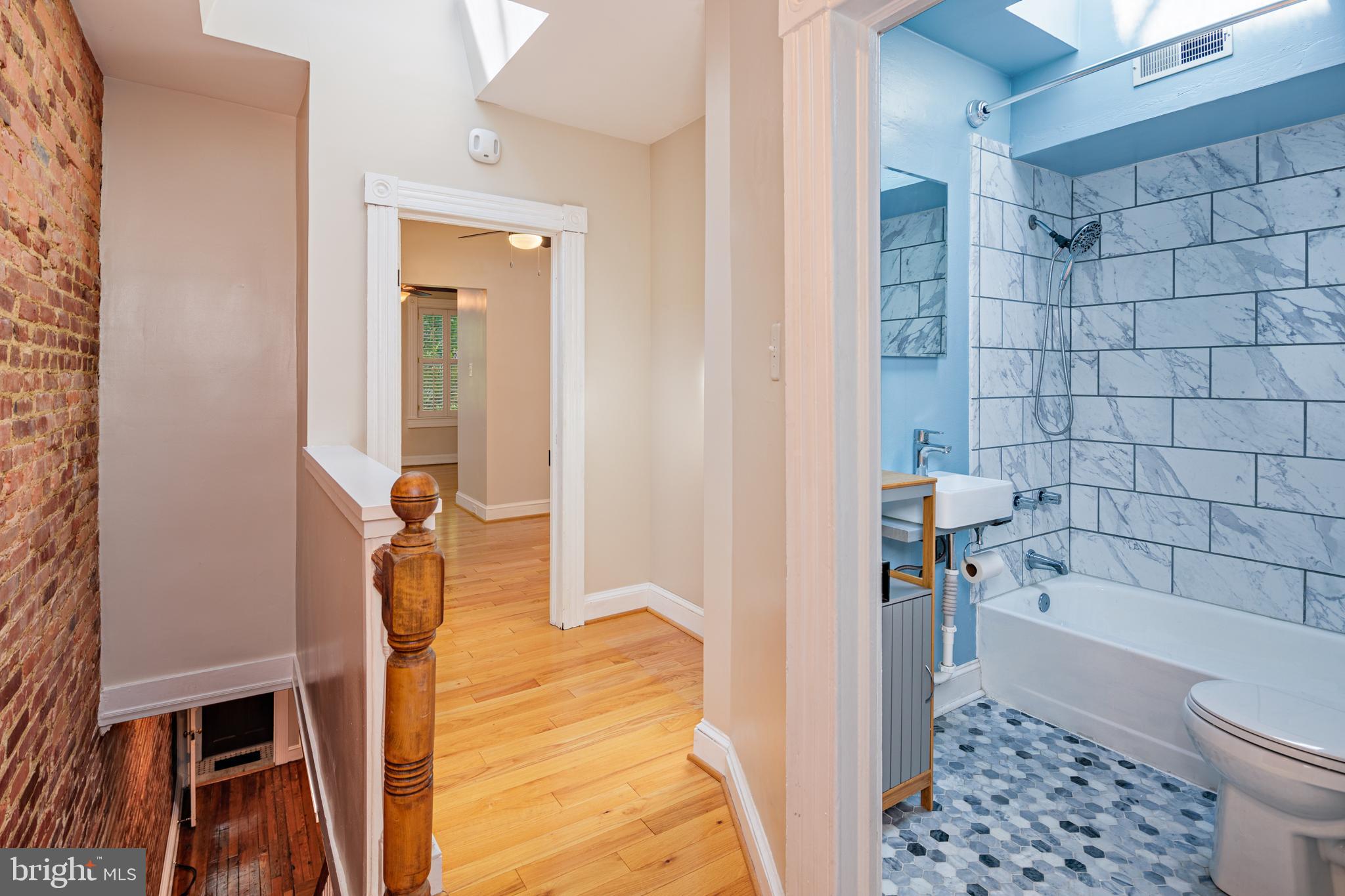 3408 Elliott Street Baltimore, MD 21224 - Photo 16 of 40 Two skylights to make this one shine!