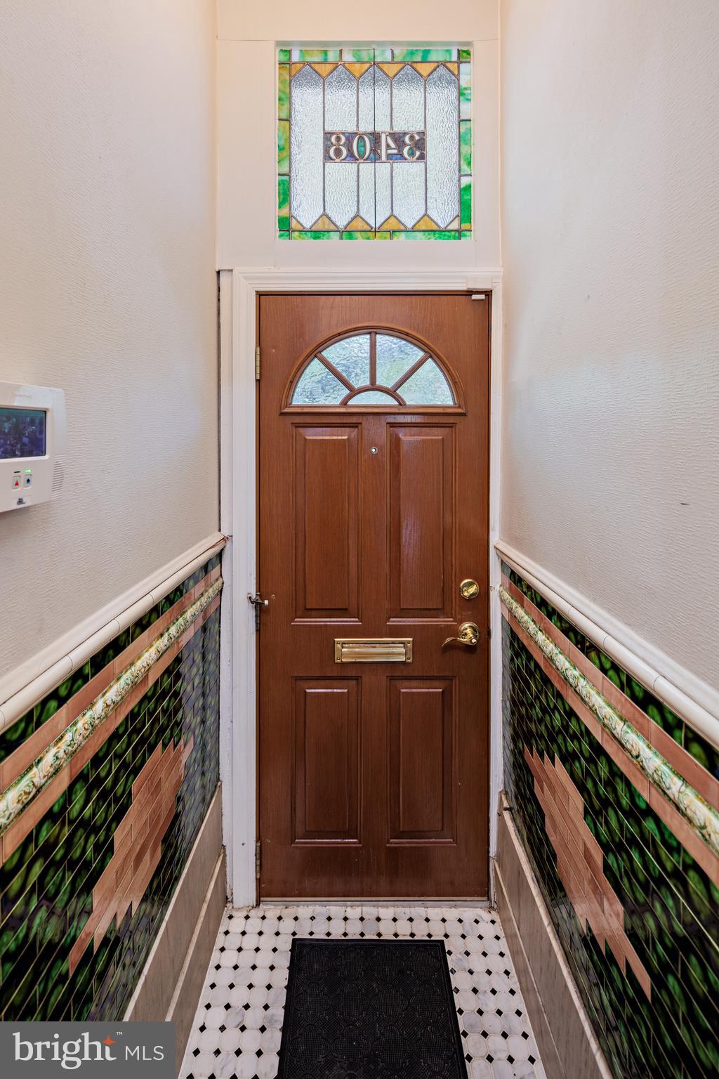 3408 Elliott Street Baltimore, MD 21224 - Photo 2 of 40 Gorgeous tile in original foyer