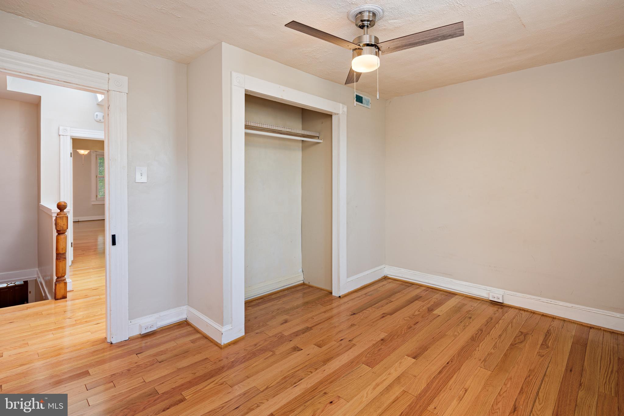 3408 Elliott Street Baltimore, MD 21224 - Photo 23 of 40 Rear bedroom upstairs with a cozy balcony!