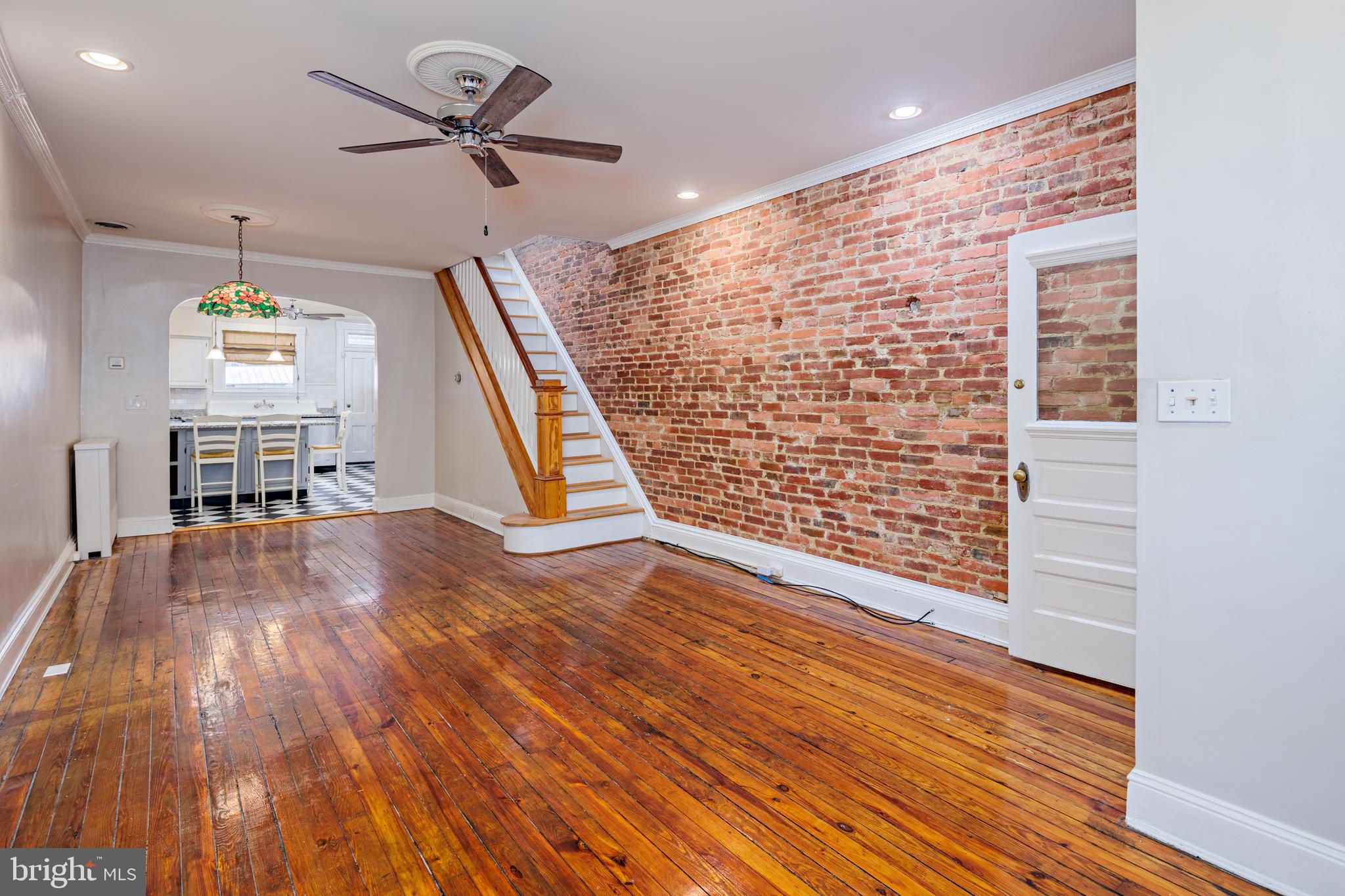 3408 Elliott Street Baltimore, MD 21224 - Photo 3 of 40 Original hardwoods in spacious living room!