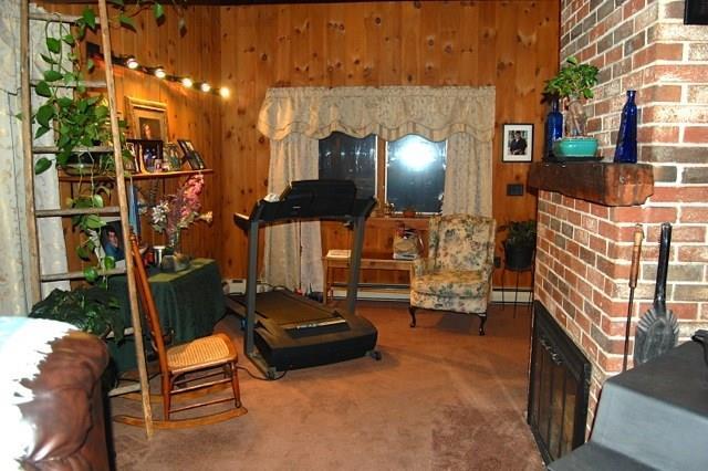 522 Shady Nook Road West Newfield, ME 04095 - Photo 10 of 30 Living room w/ fireplace.