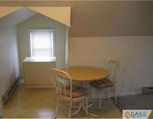438 Georges Road North Brunswick, NJ 08902 - Photo 14 of 21 a view of a dining room with furniture and window