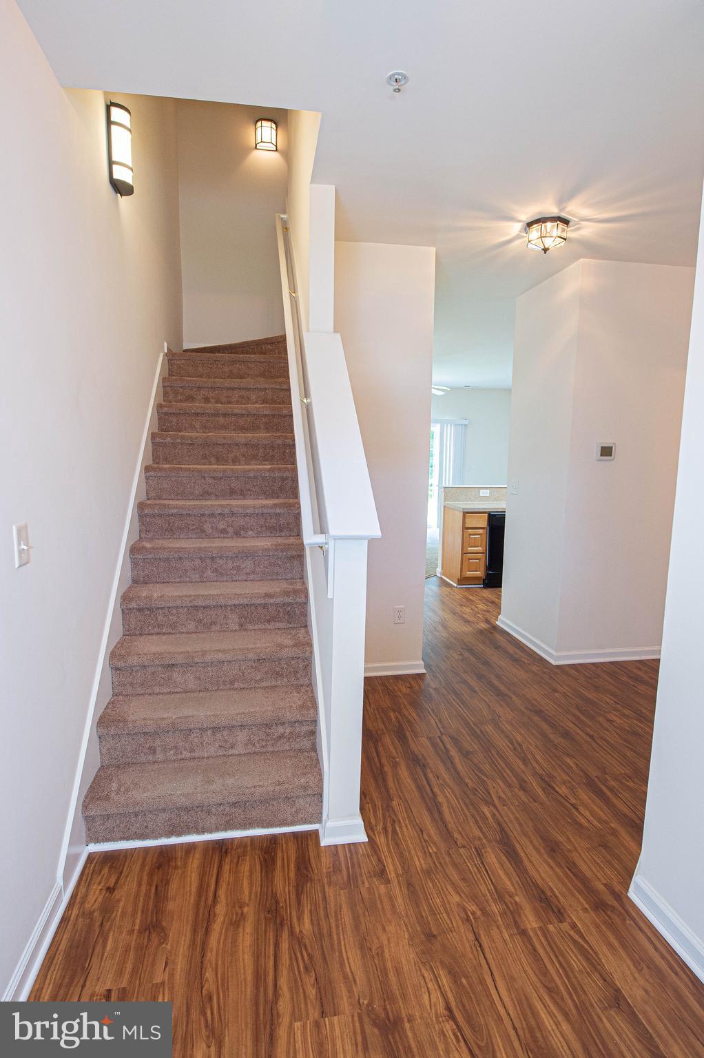 420 Parkview Court, Unit F Salisbury, MD 21804 - Photo 11 of 87 a view of entryway and hall with wooden floor