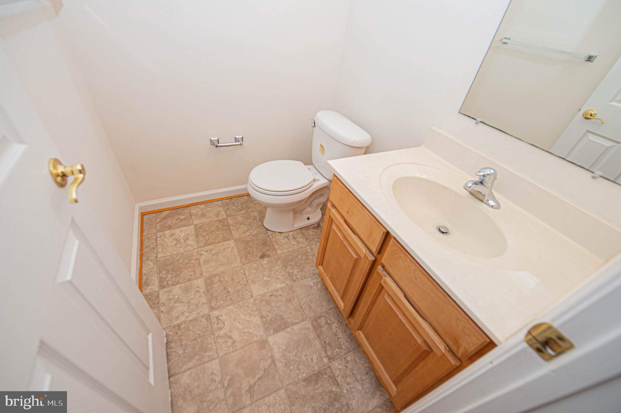 420 Parkview Court, Unit F Salisbury, MD 21804 - Photo 15 of 87 a bathroom with a sink and a toilet