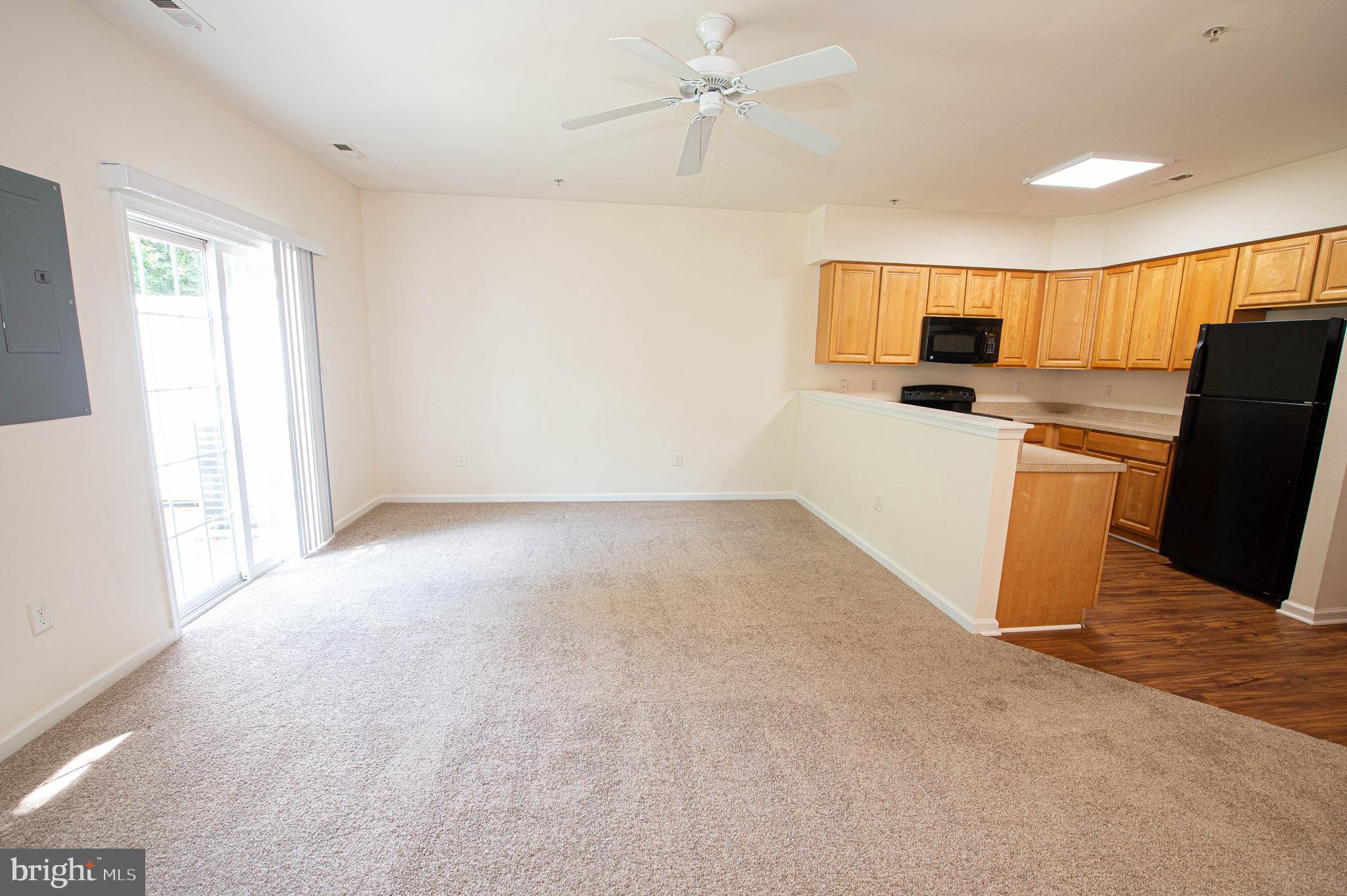 420 Parkview Court, Unit F Salisbury, MD 21804 - Photo 30 of 87 a view of a kitchen with a sink and a refrigerator