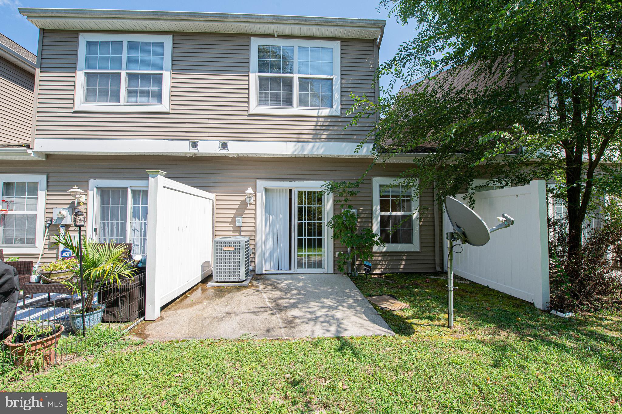 420 Parkview Court, Unit F Salisbury, MD 21804 - Photo 39 of 87 a front view of a house with a yard and porch