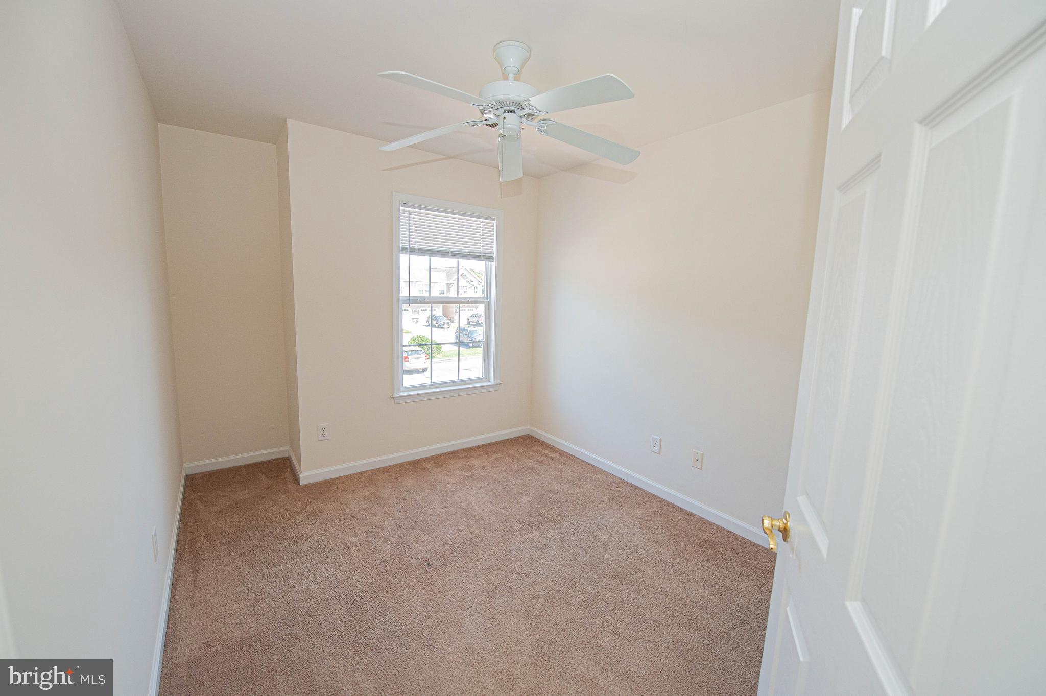 420 Parkview Court, Unit F Salisbury, MD 21804 - Photo 70 of 87 an empty room with windows and closet