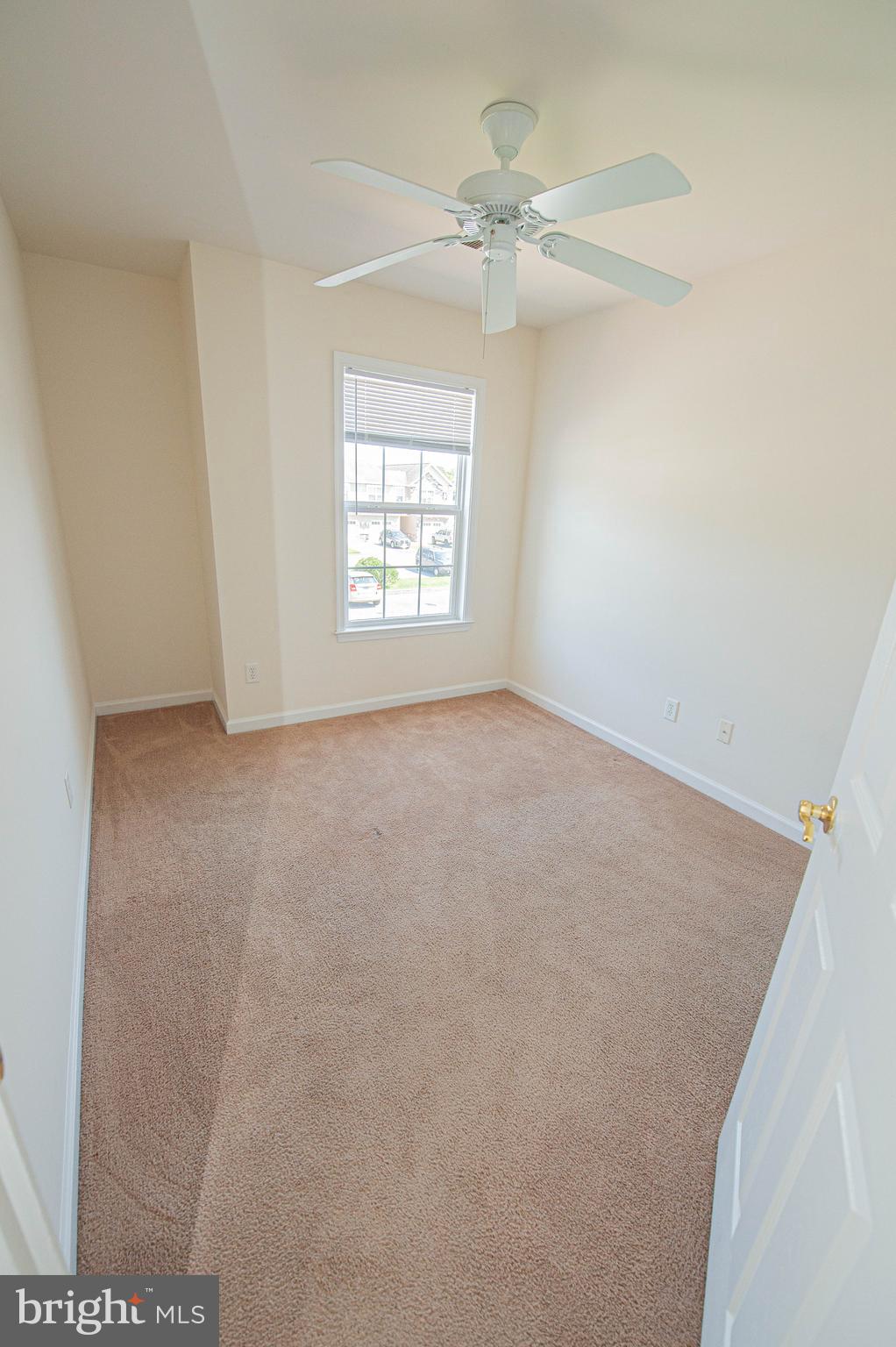 420 Parkview Court, Unit F Salisbury, MD 21804 - Photo 71 of 87 an empty room with windows and fan