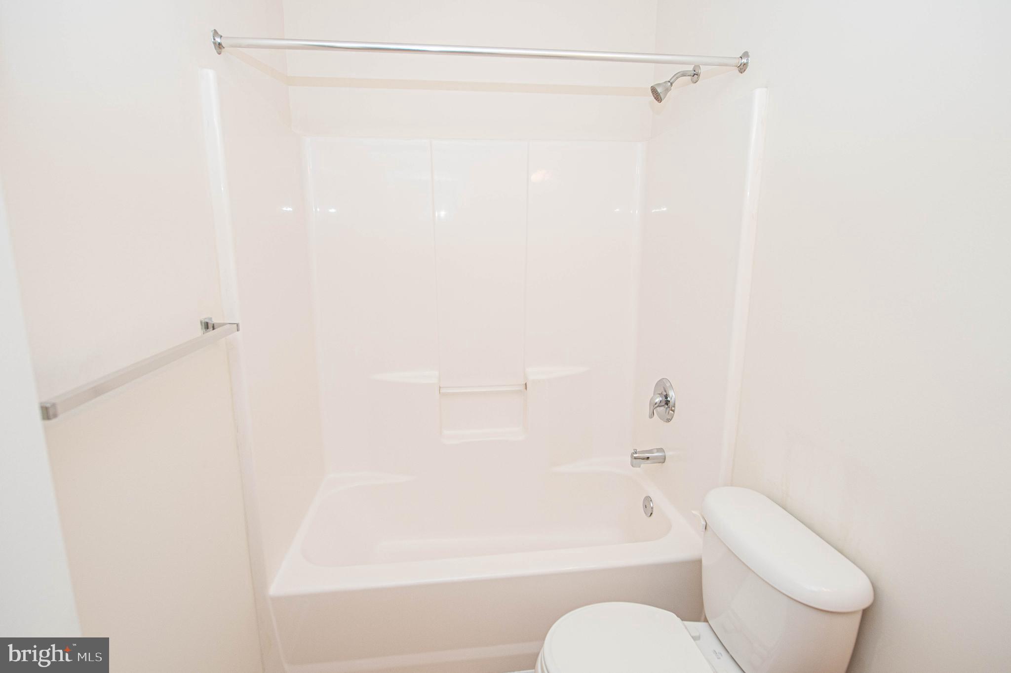 420 Parkview Court, Unit F Salisbury, MD 21804 - Photo 82 of 87 a bathroom with a shower a toilet and a shower