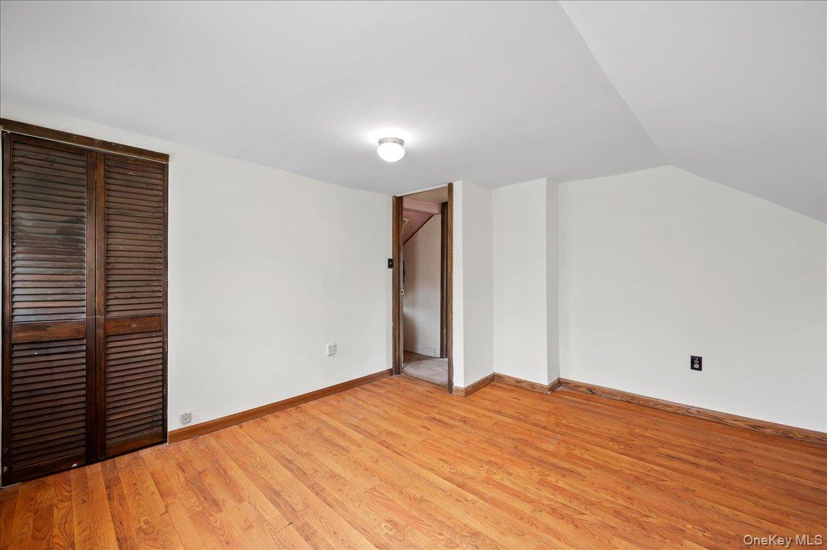 35 Fallkill Avenue Poughkeepsie, NY 12601 - Photo 20 of 21 a view of empty room with wooden floor