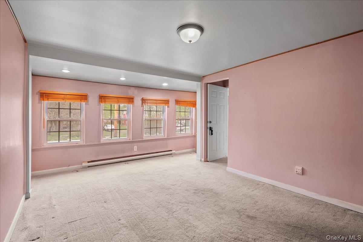 35 Fallkill Avenue Poughkeepsie, NY 12601 - Photo 6 of 21 an empty room with windows