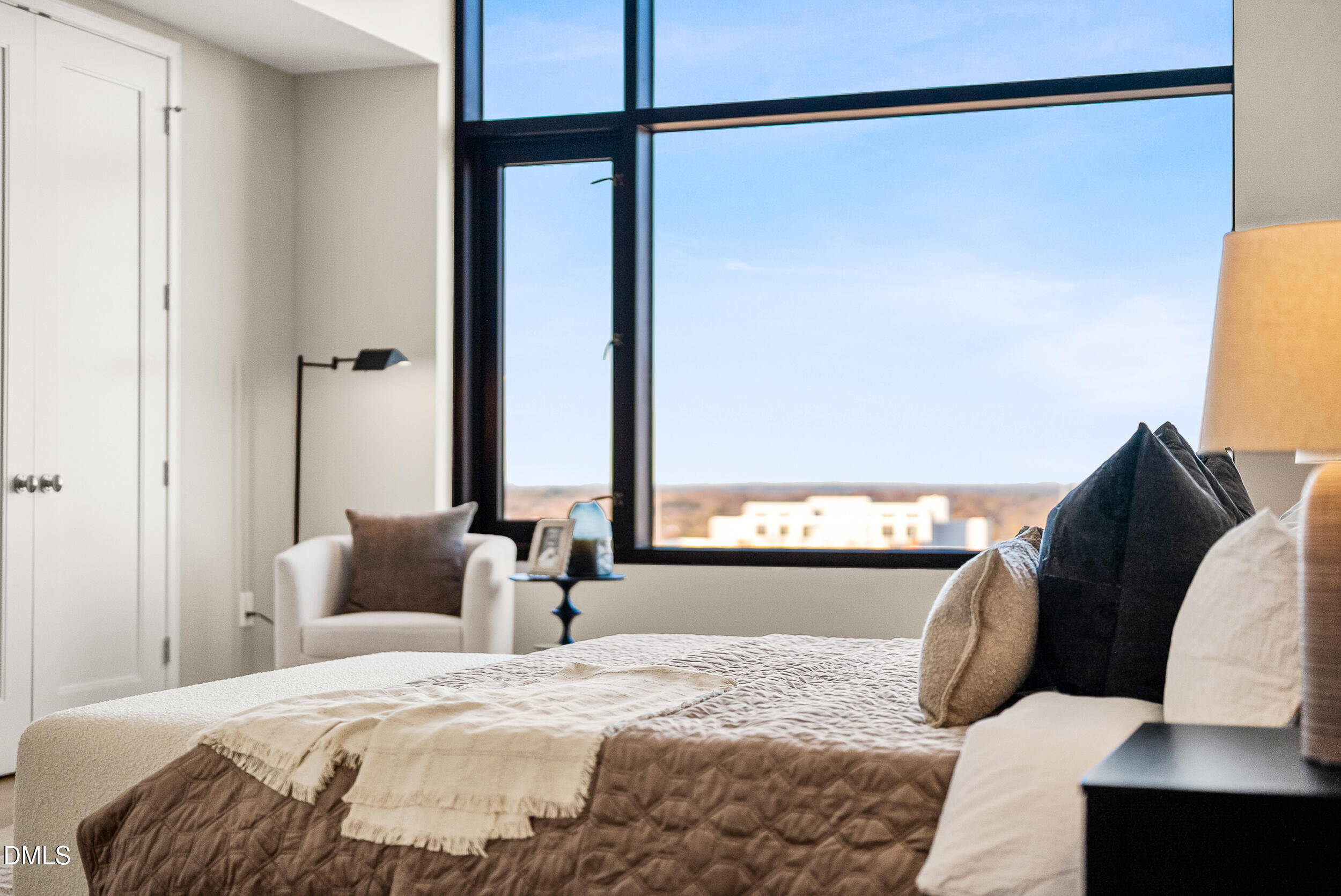 122 North Harrington Street Raleigh, NC 27603 - Photo 18 of 46 a bedroom with a bed and wooden floor
