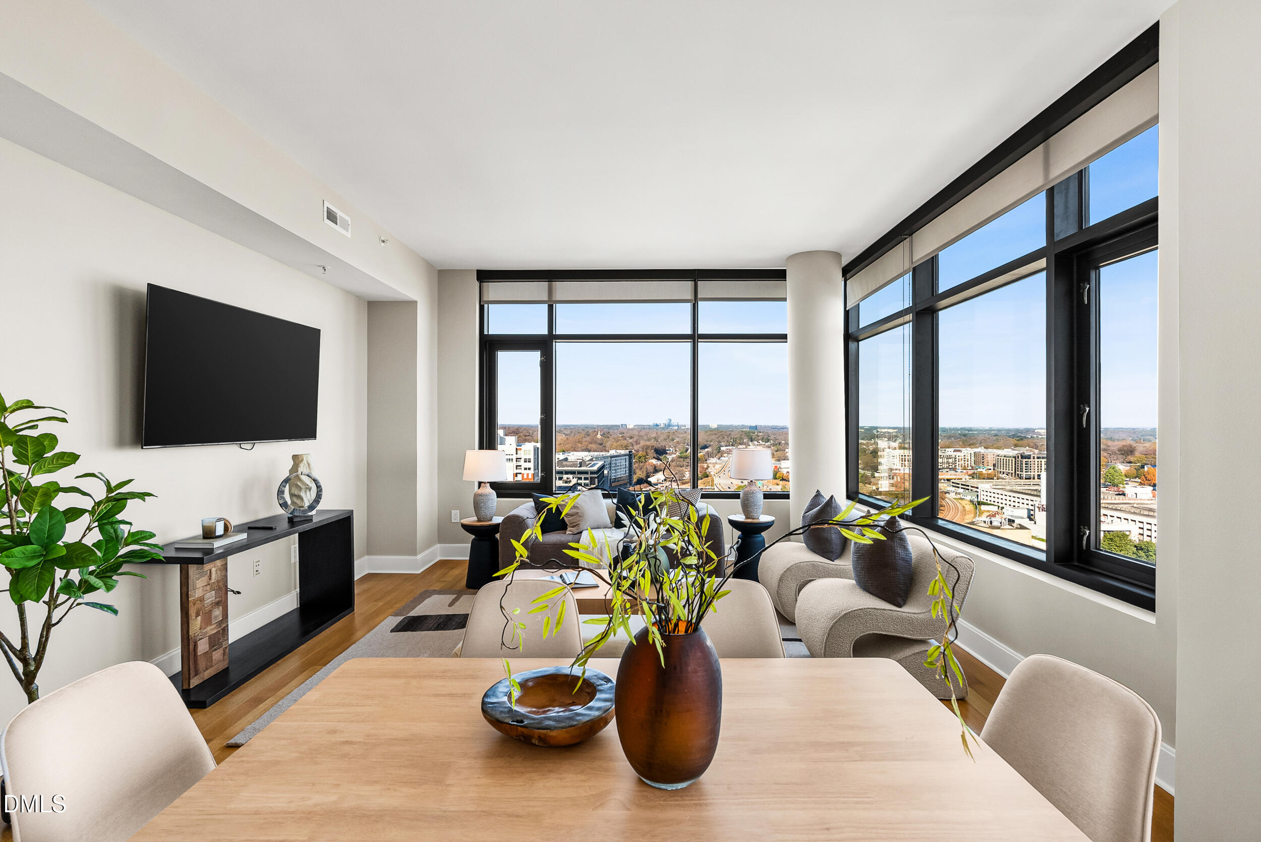 122 North Harrington Street Raleigh, NC 27603 - Photo 5 of 46 a living room with furniture and a flat screen tv