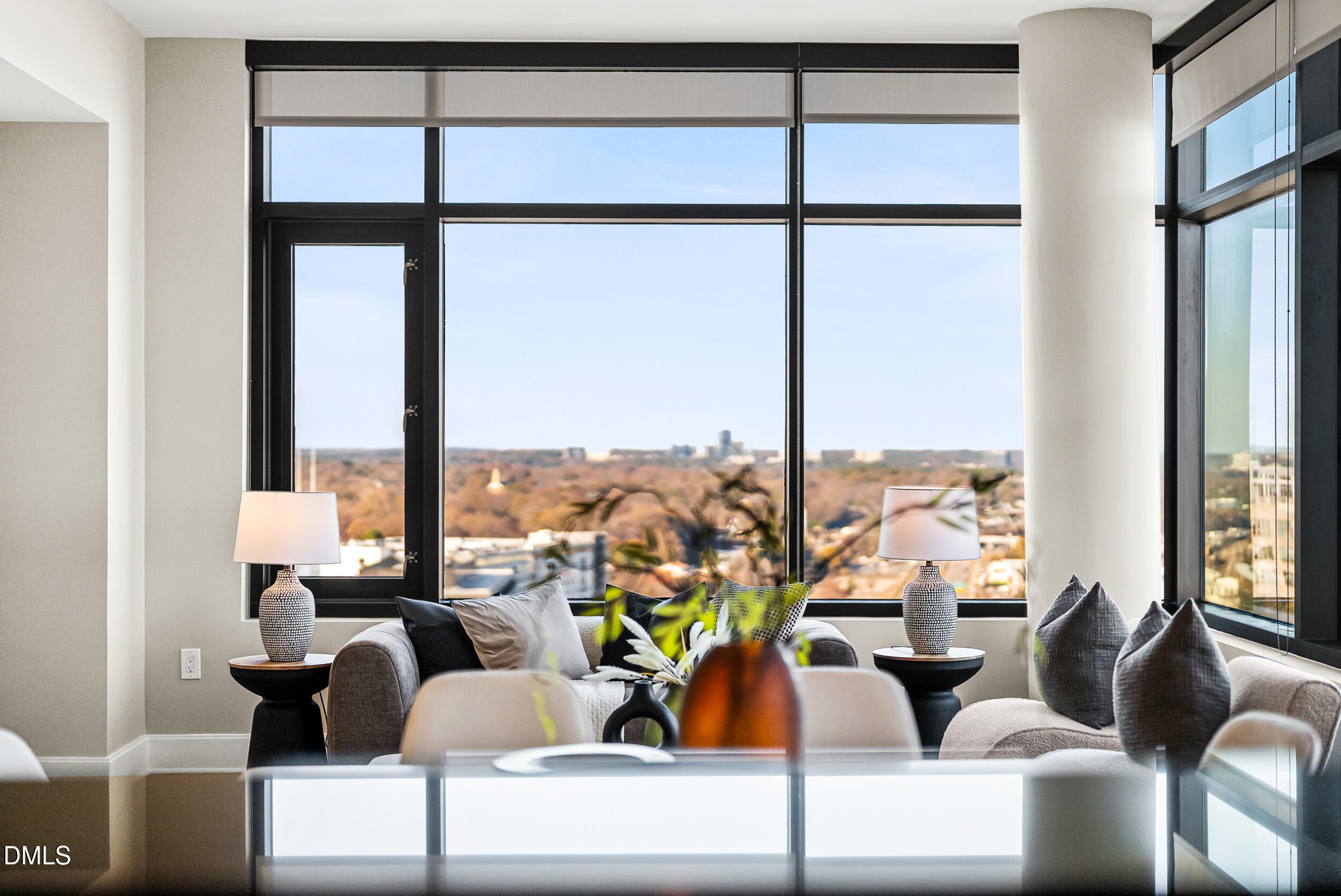 122 North Harrington Street Raleigh, NC 27603 - Photo 7 of 46 a view of living room with furniture and floor to ceiling windows