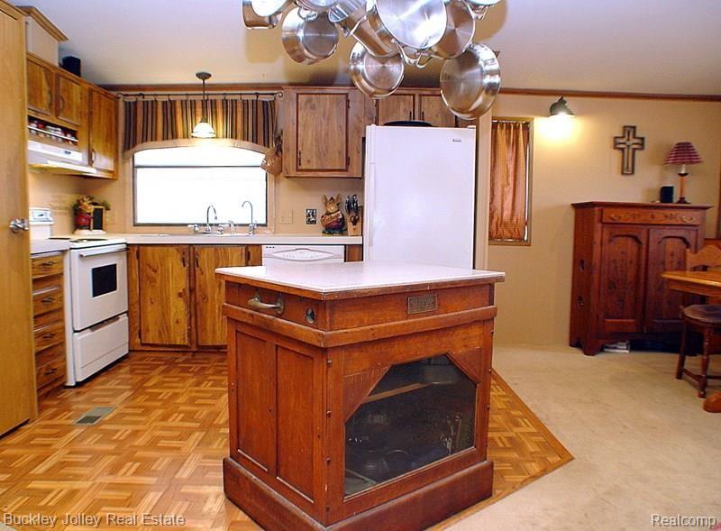 1900 Brewer Road Howell, MI 48855 - Photo 4 of 17 Extra Storage in the Kitchen.jpg