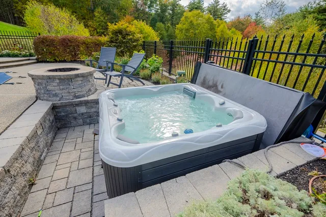 a view of a chairs and table in the balcony