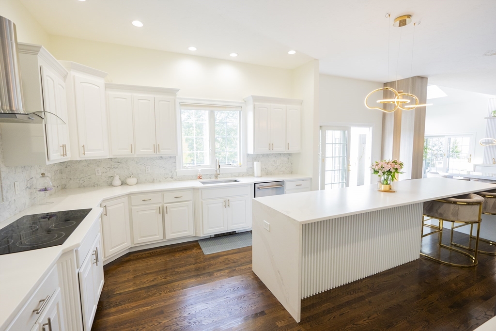 25 Collins Road Berlin, MA 01503 - Photo 16 of 38 a kitchen with white cabinets and sink