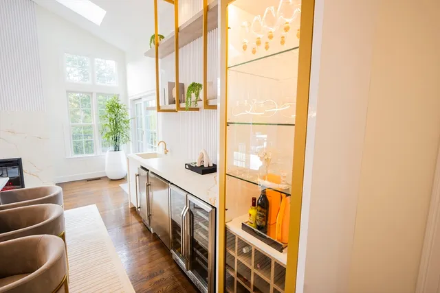 a view of a kitchen with furniture and a window