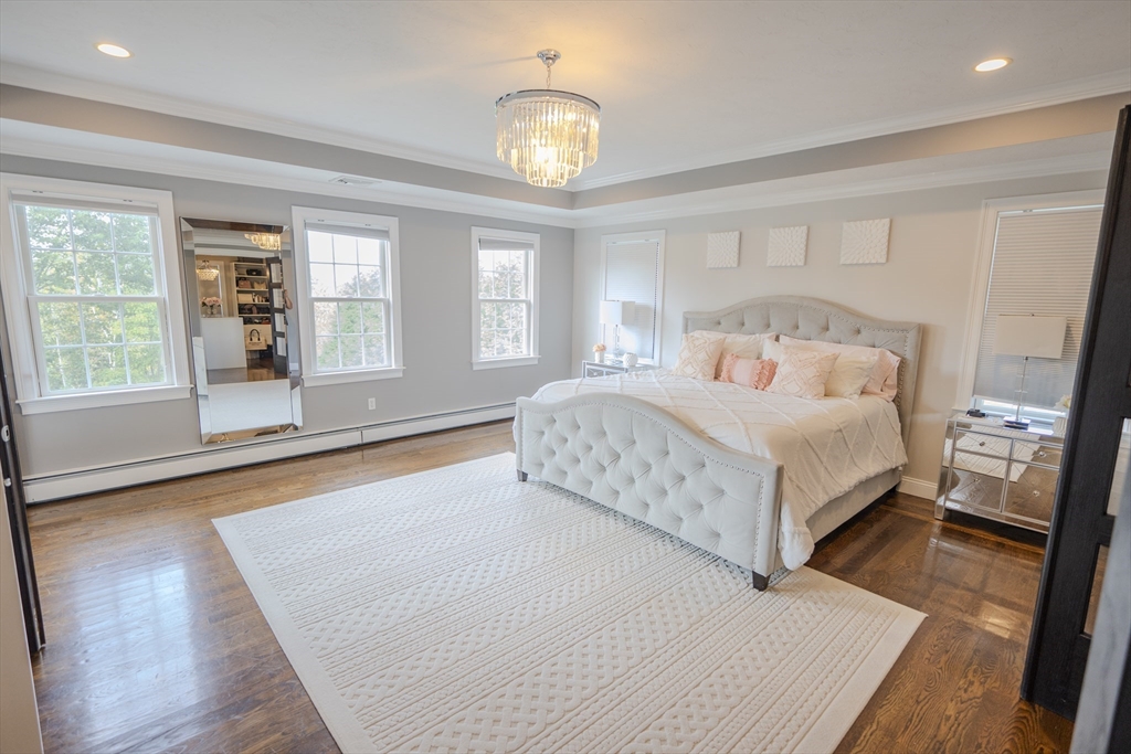 25 Collins Road Berlin, MA 01503 - Photo 29 of 38 a bedroom with a bed and a large window