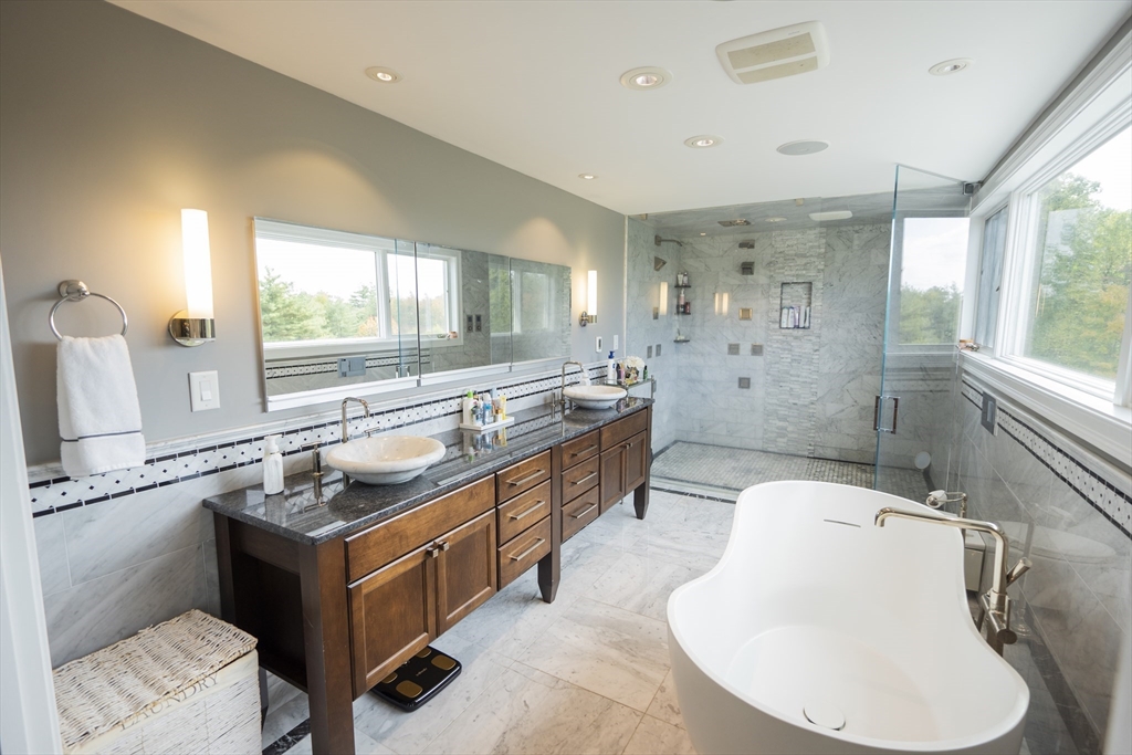 25 Collins Road Berlin, MA 01503 - Photo 31 of 38 a kitchen with a stove a sink and a refrigerator