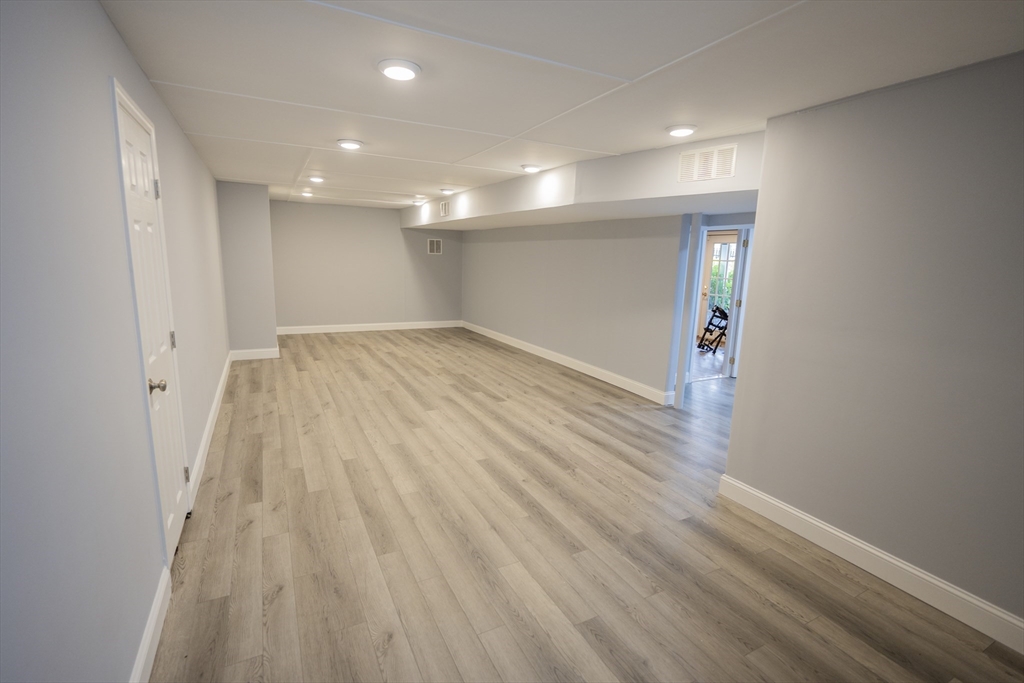 25 Collins Road Berlin, MA 01503 - Photo 35 of 38 a view of empty room with wooden floor