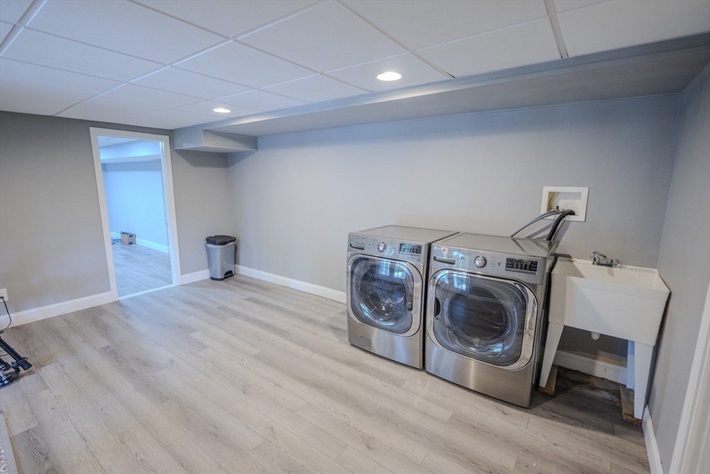 25 Collins Road Berlin, MA 01503 - Photo 38 of 38 a utility room with dryer and washer