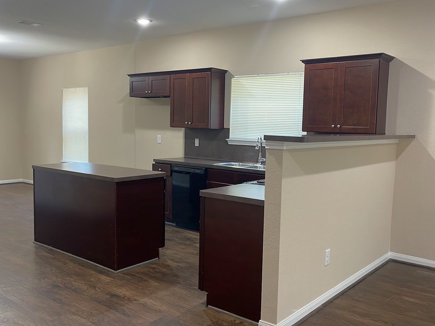 8138 Gallahad Street, Unit A Houston, TX 77078 - Photo 14 of 26 a kitchen with stainless steel appliances granite countertop a refrigerator and a stove top oven
