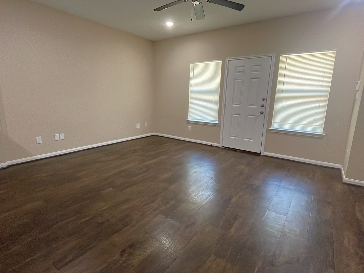 8138 Gallahad Street, Unit A Houston, TX 77078 - Photo 15 of 26 an empty room with wooden floor and windows