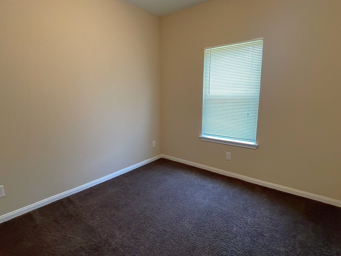 8138 Gallahad Street, Unit A Houston, TX 77078 - Photo 9 of 26 an empty room with a window
