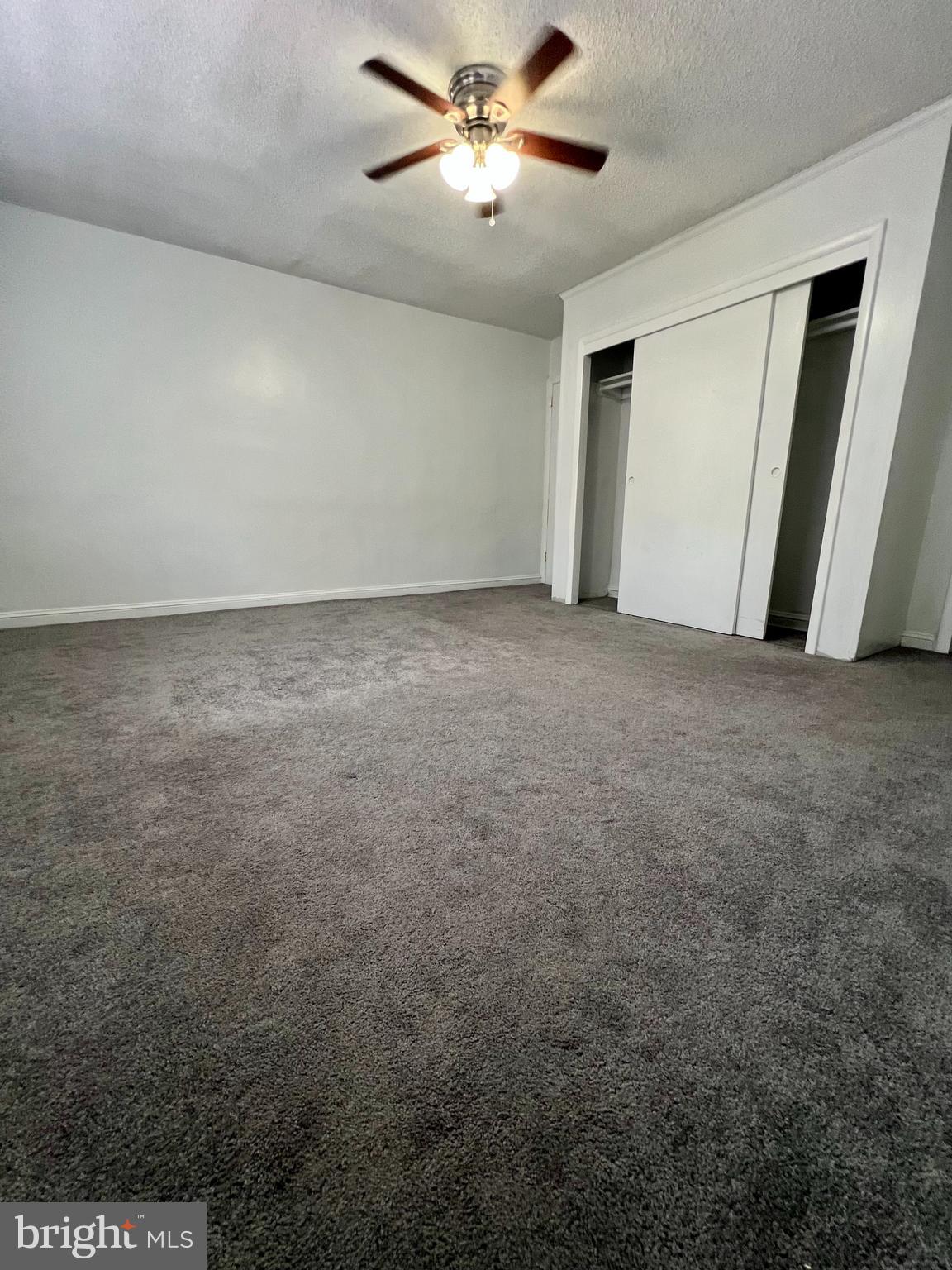 624 Briarcliff Road, Unit MAIN Upper Darby, PA 19082 - Photo 12 of 20 a view of a big room with carpet
