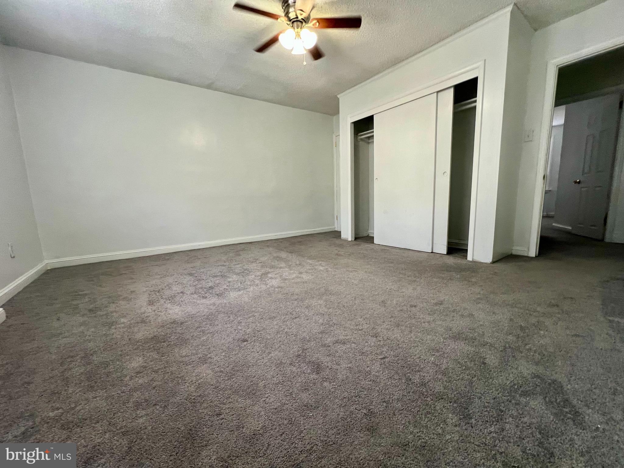 624 Briarcliff Road, Unit MAIN Upper Darby, PA 19082 - Photo 13 of 20 an empty room with closet and fan