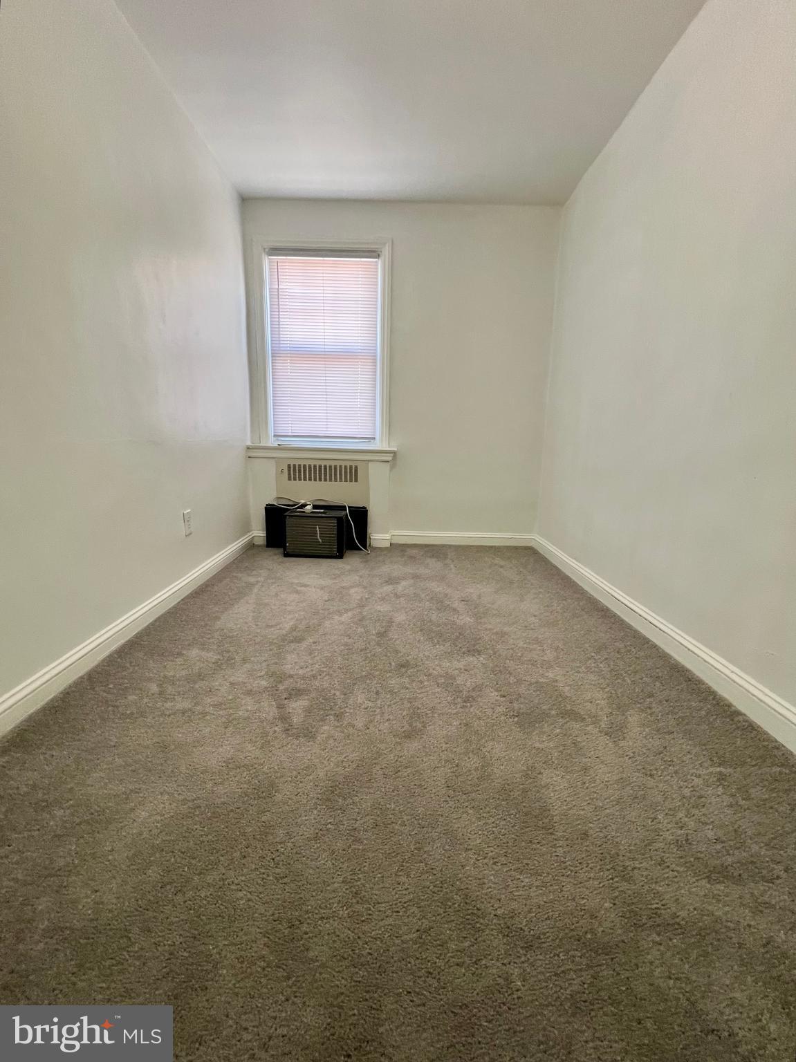 624 Briarcliff Road, Unit MAIN Upper Darby, PA 19082 - Photo 19 of 20 an empty room with windows
