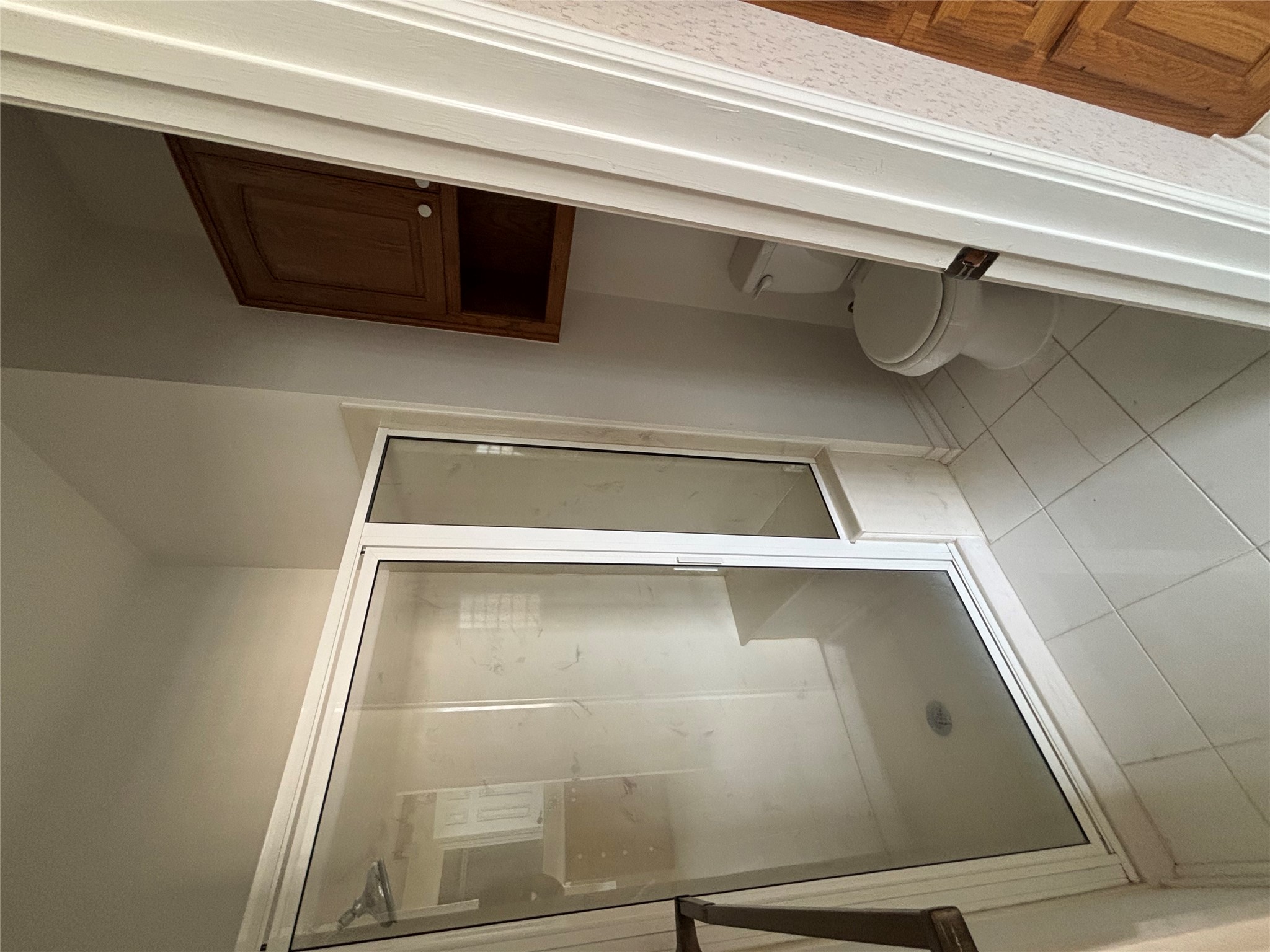 140 County Road 167 Georgetown, TX 78626 - Photo 15 of 21 a bathroom with a glass door shower and toilet