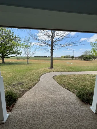 a view of an ocean from a yard