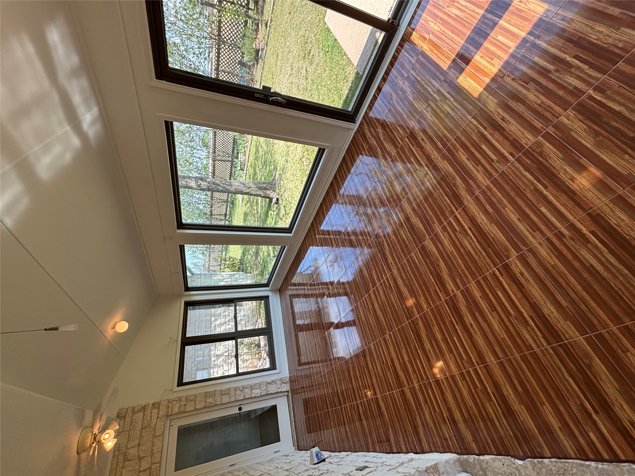 140 County Road 167 Georgetown, TX 78626 - Photo 9 of 21 a view of a room with wooden floor and large windows