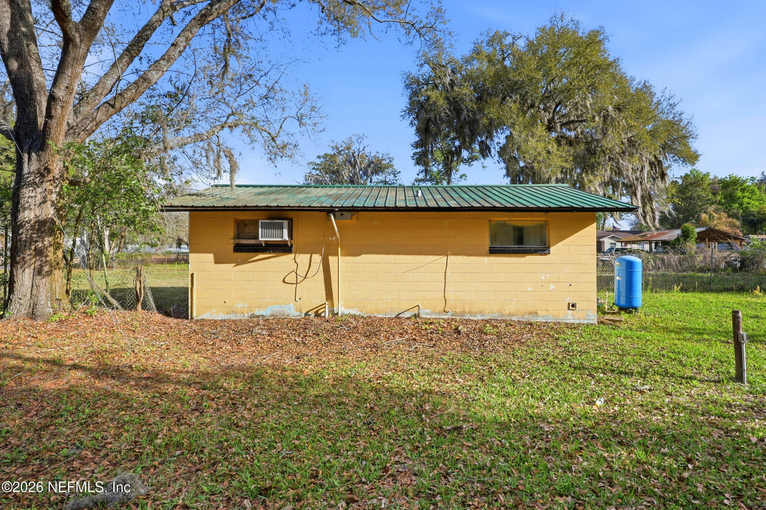 9843 Wagner Road Jacksonville, FL 32219 - Photo 22 of 40 a view of a house with a tree