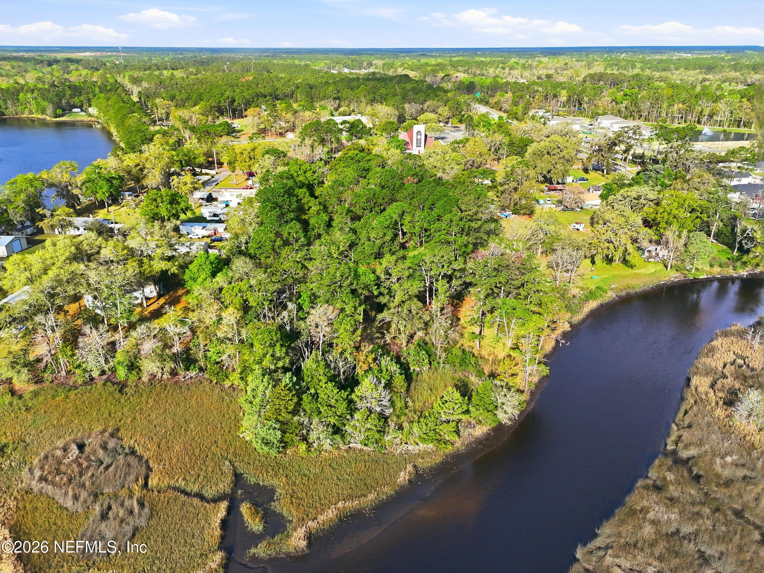 9843 Wagner Road Jacksonville, FL 32219 - Photo 34 of 40 a view of a lake with a big yard