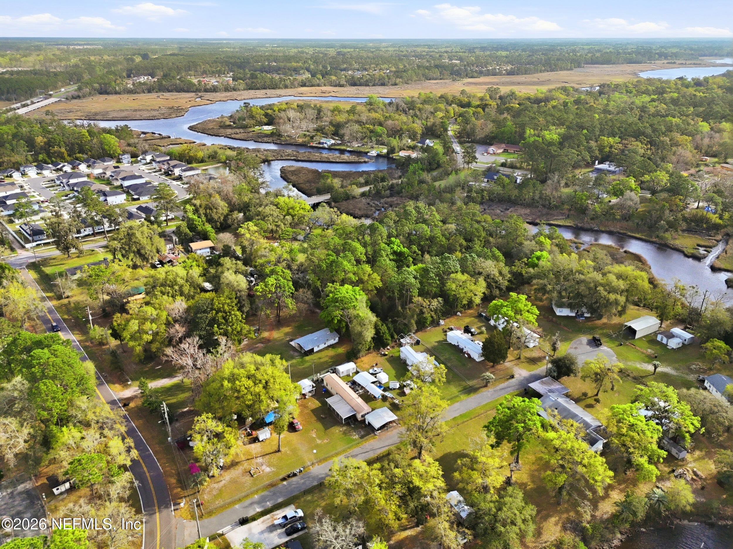 9843 Wagner Road Jacksonville, FL 32219 - Photo 37 of 40 an aerial view of residential houses with outdoor space