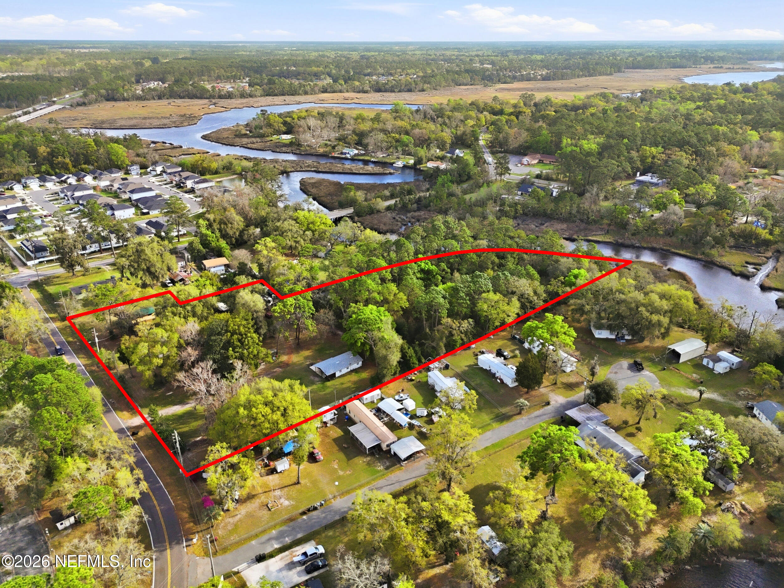 9843 Wagner Road Jacksonville, FL 32219 - Photo 38 of 40 an aerial view of residential houses with outdoor space